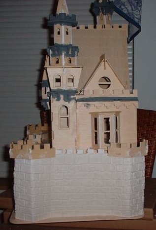 CDHM Artisan Tracy Topps of Minis On The Edge creates paper clay dollhouses in 1:12, 1:24, 1:48 and even 144 scale dollhouse kits.  Finishing the dollhouses in the style of the old european castles, and victorian styles of england, you america