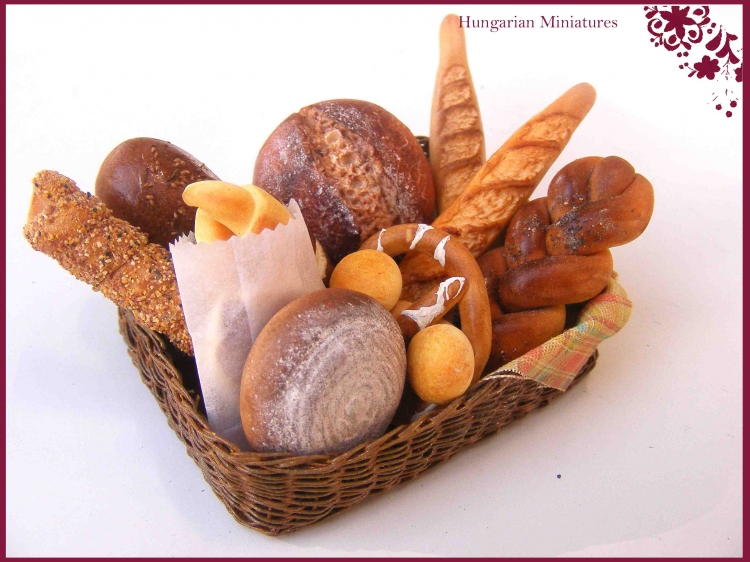 CDHM Artisan Erzsébet Bodzás of Hungarian Miniatures creating dollhouse miniature-foods-including breads, crazy cakes, prep tables in 1:12 scale