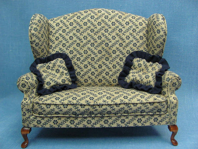 CDHM Artisan Kris Compas of 1 Inch Minis has made this winged settee in dollhouse miniature scale, measuring 5 1/8
