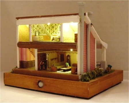 Interior and lite Crafters cottage in 144 scale by CDHM Artisan Lauretta Carroll of Midnight Magic Miniatures