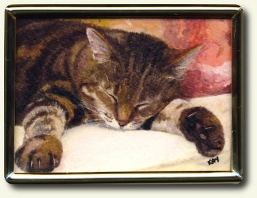 CDHM artisan Kay Burton paints miniature kittens and cats in acrylic