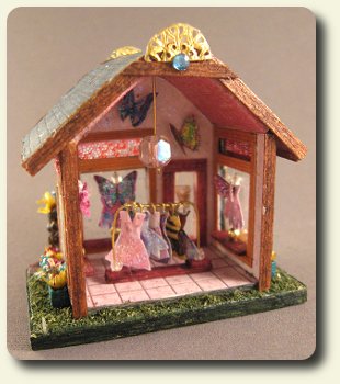 CDHM artisan Pat Carlson creating under the business name of Pat Carlson Miniature creates dollhouse miniature fairy dress boutique in 144 scale