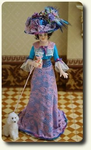 CDHM and IGMA artisan Elisa Fenoglio creates porcelain dressed dolls in dollhouse scale
