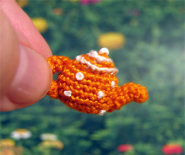 CDHM forum member Antonina hand crocheted a tiny scale teapot