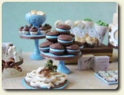 CDHM Artisan Stephanie Kilgast has created this 1:12 scale realistic sweets table for the dollhouse miniature collector