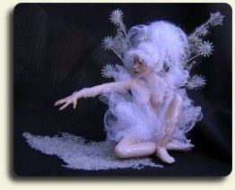 CDHM artisan Judy A. Raley created this handmade sculpted and dressed fairy child with teddy bear in 1/12 scale dollhouse miniatures