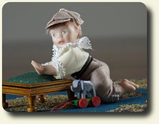 CDHM artisan Vynette van der Heijden creates handmade sculpted and dressed 1:12 dolls in dollhouse scale