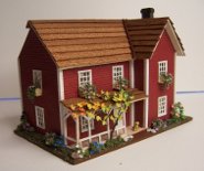 CDHM artisan Karin Caspar makes german fashioned dollshouses in 1:12 scale miniatures and 144 scale dollhouses