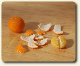 CDHM artisan Hanna Lindroth doing business as Mini Chef shows you a how-to on making peeled oranges in dollhouse 1:12 scale