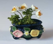 CDHM artisan Christiane Lourier creates 1:12, 1/24 and 1/2 scale pottery vases and goblets for the dollhouse miniatures