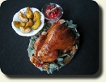 Turkey dinner in 1:12 scale by CDHM Artisan and IGMA Fellow Betsy Niederer