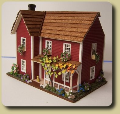 CDHM Artisan Karin Caspar creates 144th scale dollhouses