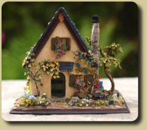 CDHM Artisan Karin Caspar creates 144th scale dollhouses