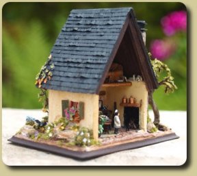 CDHM Artisan Karin Caspar creates 144th scale dollhouses