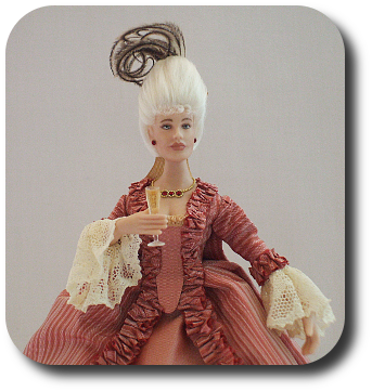 CDHM artisan Jennifer Matuszek creates handmade sculpted 1:12 dolls in dollhouse scale including porcelain dolls and character dolls