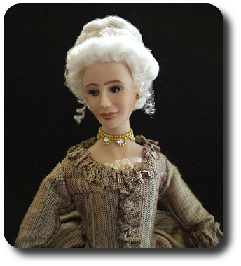 CDHM artisan Jennifer Matuszek creates handmade sculpted 1:12 dolls in dollhouse scale including santas, tudor and character dolls