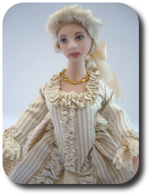 CDHM artisan Jennifer Matuszek creates handmade sculpted 1:12 dolls in dollhouse scale including porcelain dolls and character dolls