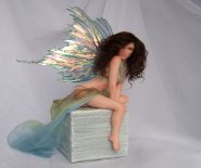 CDHM Artisan Phyllis Morrow creates hand sculpted polymer clay, wigged dolls and fairy, fairies