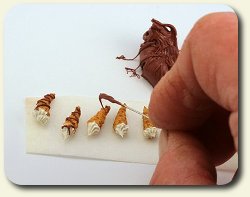 CDHM artisan and IGMA Fellow Linda Cummings shows you a how-to on making 1:12 scale cream horn pastries for your dollhouse