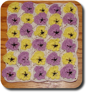 CDHM Artisan Michelle Osinski of Tiffsniffer's Tiny Things creates hand crocheted 1:12 scale bedding, including blankets from micro crochet stitches