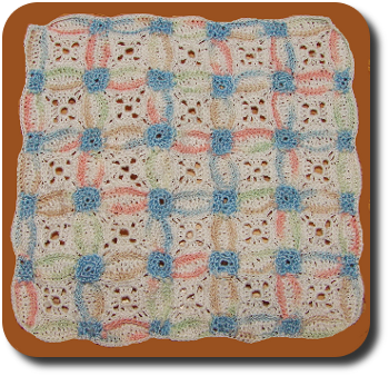 CDHM Artisan Michelle Osinski of Tiffsniffer's Tiny Things creates hand crocheted 1:12 scale bedding, including blankets from micro crochet stitches