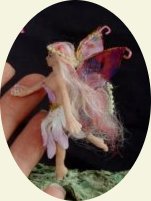 CDHM artisan Cheri Voellmann of Polkadot Toadstool, miniature sculpted art dolls