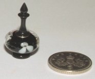 CDHM's English artisan Fiona Bateman turns with a lathe and creates a wide range of dollhouse miniatures vases, chalices, bowls and much more from exotic woods, acrylics and other materials