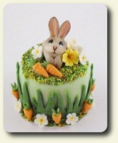 CDHM category feature, CDHM Artisan Loredana Tonetti created this 1/12 scale bunny carrot cake for Easter for the dolls house