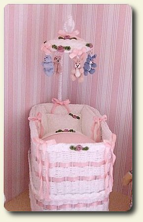 CDHM category feature, CDHM Yokozona Miniatures created this wicker mobile for the dollhouse nursery