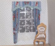 CDHM artisan Vanessa Parry makes and sews custom drapery for the dollhouse or roombox