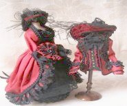 CDHM artisan Janine Crocker of Miss Amelia Miniatures creates hand dressed dolls and beds in 1/12 scale