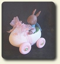 CDHM artisan Char Theurer of Bella Cavallo Studios has created a Bunny riding an Easter egg in 1:12 scale