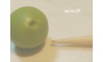 Scoring the miniature dolls apple using the toothpick