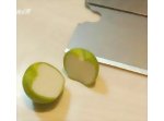 Slicing the completed miniature apples in half