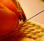 sewing the handle to the basket