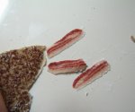 Using sandpaper to texture the miniature dollhouse bacon