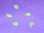 Adding detail to the polymer clay leaves