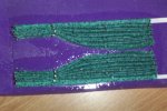 Using hairspay to stiffen the pleats