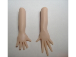 Trimming the excess clay of the polymer clay hands and fingers