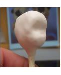 Start applying the polymer clay to the front of the skull