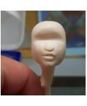 creating the mouth of the doll using polymer clay
