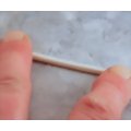 Rolling the polymer clay cane into a log shape