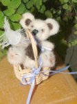 Finished miniature bear in a dollhouse basket