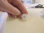 What to do if the brown wool is showing through the cream/white wool