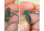 Optional carving details into the body of the dolls house miniature polymer clay parrot