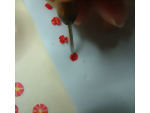 Using the stylus push center of the red circle into craft foam for your dollhouse flowers