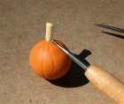 Smoothing the stem to the pumpkin