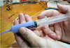 using a glue syringe