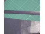 Cut a strip of scrapbook paper the length of the paper