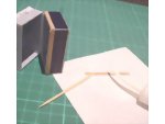 Gluing the long strips to the trunk